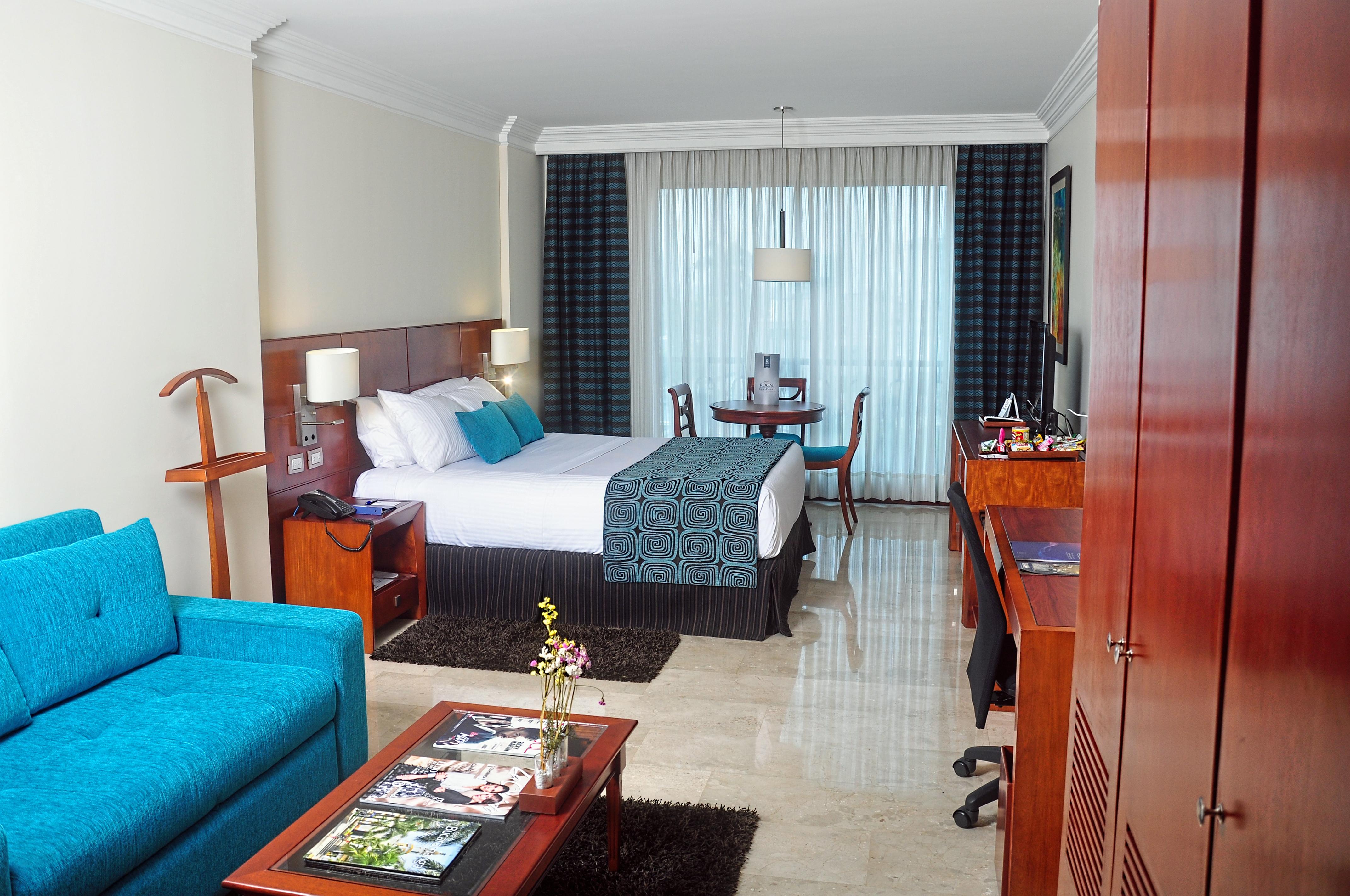 Hotel Dann Carlton 부카라망가 외부 사진 A room at the hotel